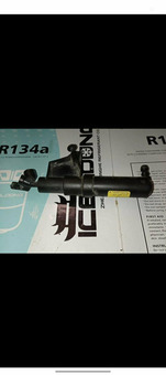 Форсунка омывателя фар правая Вольво s40